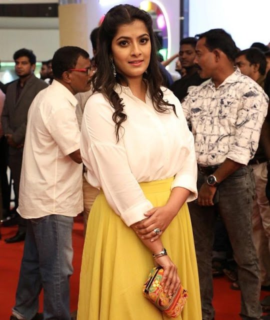 Varalaxmi Sarathkumar In White Top At Tamil Movie Celebrity Show 108